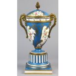 Sevres clock vase with dore bronze mounts and bright blue ground, the base with a conjoined L