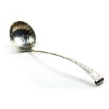 Sterling silver ladle, having a shell form bowl, the handle decorated with a foliate motif and