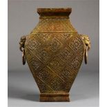Chinese bronze hu vase, of rectangular section molded with a floral diaper pattern, flanked by