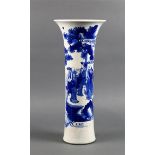 Chinese underglaze blue porcelain vase, of trumpet form featuring a group of people gathering at the