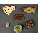 (lot of 6) Chinese archaistic hardstone carvings, including a fish with a well to the center; a