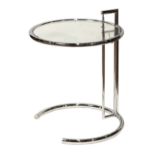 Eileen Gray adjustable table, executed in tubular steel and having a glass top, 25''h x 19.5''w