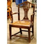 Georgian arm chair, having a pierced back, and rising on square legs, 36"h