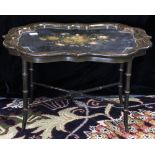 English papier mache tray on stand, the floral decorated top with mother of pearl reserves centering