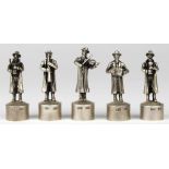 (lot of 5) Russian sterling silver bottle stopper group, each having a figural finial depicting a