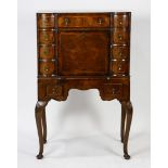 English walnut fall front desk with fitted interior, 19th century, having a shaped top with inlaid