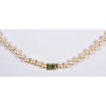 Cultured pearl, diamond and 18k yellow gold necklace Composed of (65), 7.0 mm, cultured pearls,