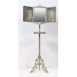 Victorian vanity shaving stand, having a trifold looking glass above the silvered dish top, and