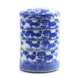 Japanese ceramic four-tier food container, blue-and-white transfer decorated with pines and