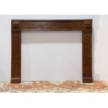 Continental carved and marquetry decorated fireplace surround circa 1860, having large relief carved