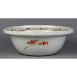 Chinese enameled porcelain basin, the well depicting the descending of a celestial being toward
