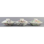 (lot of 3) Chinese lidded shallow porcelain bowls, the first featuring an array of plants