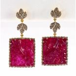 Pair of ruby, diamond and 14k yellow gold earrings Featuring (2) square carved ruby plaques,