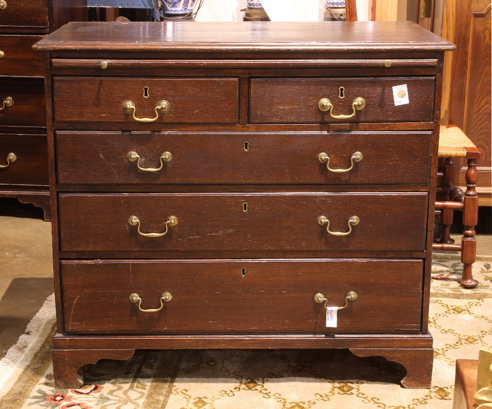 Georgian chest of drawers, the rectangular top over a (5) drawer case and rising bracket feet, 33"