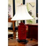 Japanese cinnabar lamp, vermilion lacquered rectangular body with flowers, on wood stand, approx.
