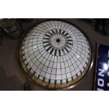 Arts and Crafts style leaded glass pendant lamp, having a dome form with carmel, cream and green