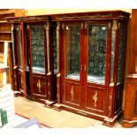 Pair of French Directoire style vitrines, having a straight cornice with mounted foliate ormolu