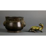 (lot of 2) Chinese bronze items: the first, a mythical beast with traces of gilt; the second, a