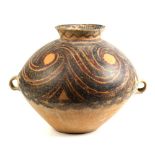 Chinese Neolithic style pottery jar, with an everted rim above the rounded shoulder decorated with