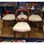 (lot of 4) Victorian balloon back parlor chairs, having a curved crest rail over the carved back and