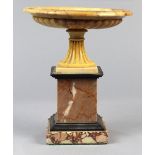 Neo-Classical style granite and marble carved garniture, the shallow variegated orange stone bowl,