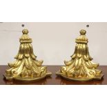 Pair Louis XV style gilt composite brackets, having a demilune top over the acanthus leaf carved