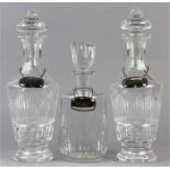 (lot of 3) Waterford & Baccarat crystal decanter group, comprising a pair of Waterford stoppered