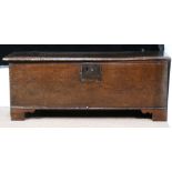 Early English or Welsh oak coffer, late 18th/early 19th century, having a hinged top, and rising