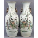 Pair of Chinese porcelain vases, the body of the baluster vase decorated with Magu with basket of