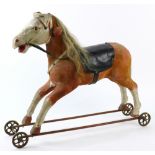Antique French children's toy horse, having leather saddle, original horse hair mane and paint,