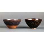 (lot of 2) Chinese Jian-type ceramic bowls, one with blue-white hue to the interior; the other
