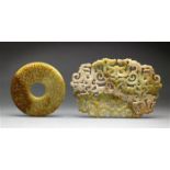 (lot of 2) Chinese hardstone archaistic items, the first a bi-disc carved with stylized scroll