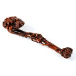 Chinese wood ruyi scepter, carved with five bats amid branches suspending large peaches, 11.25"w