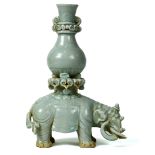 Chinese yingqing glazed porcelain vase, with a vase resting on the back of a caparisoned elephant,