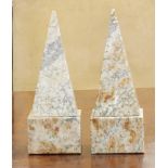 Pair of marble obelisks, each rising on a square base, 8.5"h