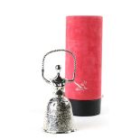 Sterling silver Lincoln Mint bell, "Alice in Daliland" after Dali, depicting a woman in a dress, 6.