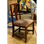 Chippendale side chair, having a pierced splat continuing tot he drop in seat, and rising on