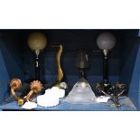 One shelf of associated lighting including wall sconces, milk glass shades, Art Deco spherical table