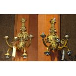 Pair of French gilt bronze wall sconces, the five arm fixtures with acanthus detail, each arm