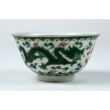 Chinese enameled porcelain bowl, exterior featuring a pair of green dragons in pursuit of a jewel,