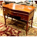 Federal style walnut campaign desk, having a shaped lift top, above the five drawer case, 33"h x