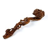 Chinese wooden ruyi scepter, the gnarled branch and head carved with Buddha hand citron, 11.25"w