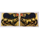 Pair of Himalayan polychromed copper alloy plaques, each with a repousse lion accented with blue-