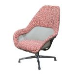 Coalesse by Steelcase swivel armchair, having red and cream patterned upholstery, with geometric