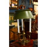 Louis XV style bouillotte table lamp, having three arms, with a green tole shade, 28"h