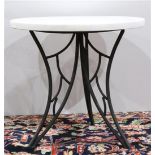 Italian occasional table, circa 1960, having a circular marble top, above the patinated metal
