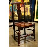 Baroque side chair, having a plank seat with shield form splat, 35.5"h