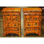 Pair of Chinese polychrome lacquered orange cabinets, fronted by drawers featuring scholar's