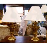 (lot of 2) Louis XV style giltwood lamps, each having a single light above an urn form base, 32.5"h