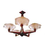 Art Deco chandelier having five lights, with frosted glass shades continuing to brass supports, 19"